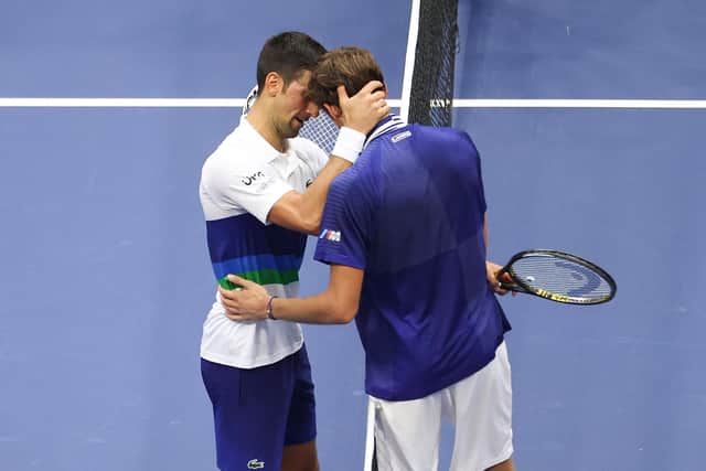 Djokovic and Medvedev embraced at the net after the match.