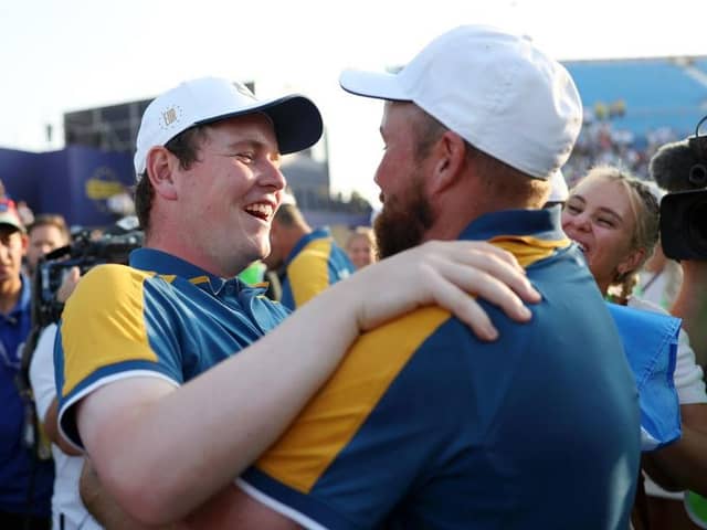 Bob MacIntyre and Shane Lowry celebrate Europe's victory in last year's Ryder Cup at Marco Simone Golf Club in Rome. Picture: Naomi Baker/Getty Images.