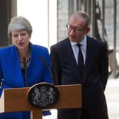 Britain's outgoing prime minister Theresa May, (L), accompanied by her husband Philip, gives a speech outside 10 Downing street in London on July 24, 2019 before formally tendering her resignation at Buckingham Palace. Photo credit should read ISABEL INFANTES/AFP via Getty