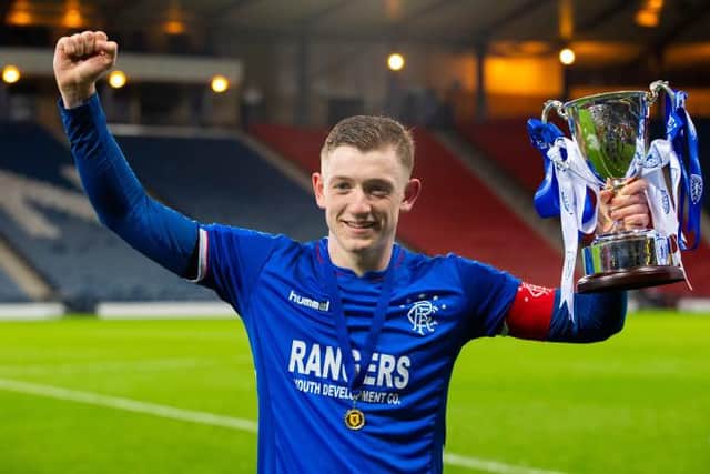 Rangers' Daniel Finlayson lifts the 2019 Scottish Youth Cup