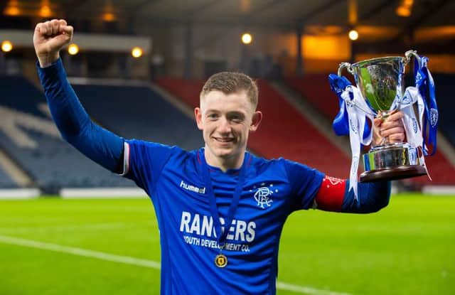 Rangers' Daniel Finlayson lifts the 2019 Scottish Youth Cup