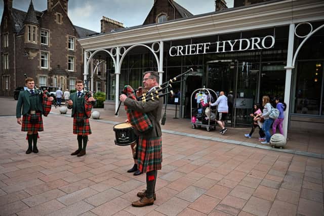 Crieff Hydro Hotel CEO, Stephen Leckie, and his children a special welcome back to guests as they open for the first time since March on July 15, 2020 in Crieff, Scotland. (Photo by Jeff J Mitchell/Getty Images)