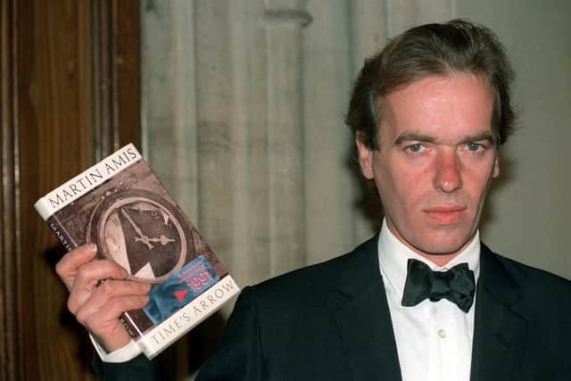 Martin Amis in 1991. His book Time's Arrow was a story told backwards, another example of his firecracker fiction (Picture: Rebecca Naden/PA)