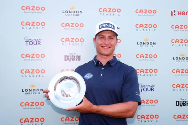 Calum Hill with the trophy following his Cazoo Classic win at the London Golf Club. Picture: Andrew Redington/Getty Images.