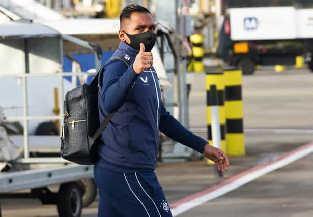 Alfredo Morelos in upbeat mood as Rangers leave Glasgow Airport for their Europa League Group D match against Benfica in Lisbon. (Photo by Alan Harvey / SNS Group)
