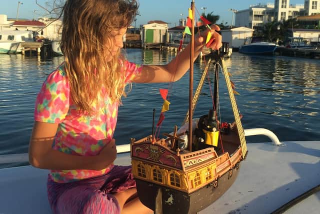 A young girl in Belize who has welcomed Adventure II to the country picture: supplied