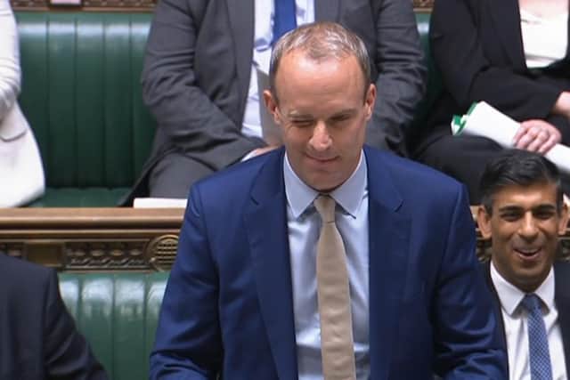Deputy Prime Minister Dominic Raab winks at Deputy Labour Leader Angela Rayner during Prime Minister's Questions.