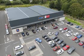 The site consists of two retail warehousing units, which are let on long-term leases to Aldi and Home Bargains, alongside a drive-thru coffee shop unit. Picture: McAteer Photograph