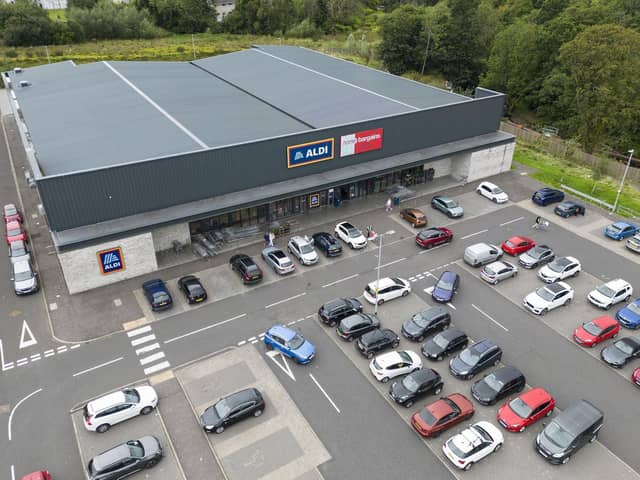 The site consists of two retail warehousing units, which are let on long-term leases to Aldi and Home Bargains, alongside a drive-thru coffee shop unit. Picture: McAteer Photograph