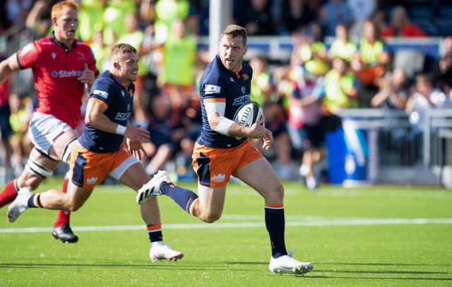 Mark Bennett goes through to score Edinburgh's first try at their new stadium. Picture: Ross Parker/SNS
