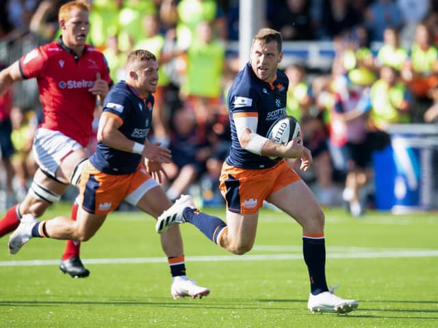 Mark Bennett goes through to score Edinburgh's first try at their new stadium. Picture: Ross Parker/SNS