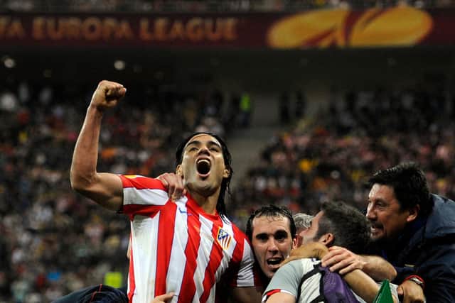 Colombian striker Radamel Falcao celebrates winning the Europa League Final with Atletico Madrid in Bucharest in 2012. (Photo by Pierre-Philippe Marcou/AFP/GettyImages)