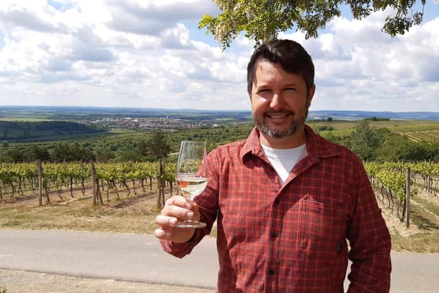 Jan Stavek, a fourth generation wine grower, toasts another bumper crop at his vineyard near the village of Nemcicky, Moravia. Pic: PA Photo/Chris Wiltshire.