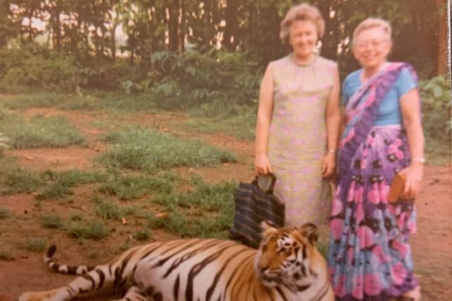 Marion Conacher (left) and her friend Ruth Hofstetter with Kairi the Royal Bengal tiger