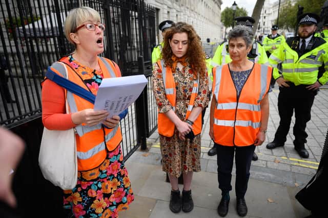The Insulate Britain campaign group, seen delivering a letter to 10 Downing Street, has helped to highlight the need to improve home insulation (Picture: Leon Neal/Getty Images)