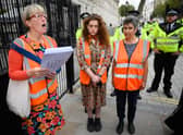 The Insulate Britain campaign group, seen delivering a letter to 10 Downing Street, has helped to highlight the need to improve home insulation (Picture: Leon Neal/Getty Images)