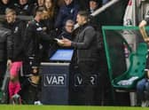 Dundee United striker Steven Fletcher leaves the pitch after being given a round of applause by Hibs supporters. (Photo by Ross Parker / SNS Group)