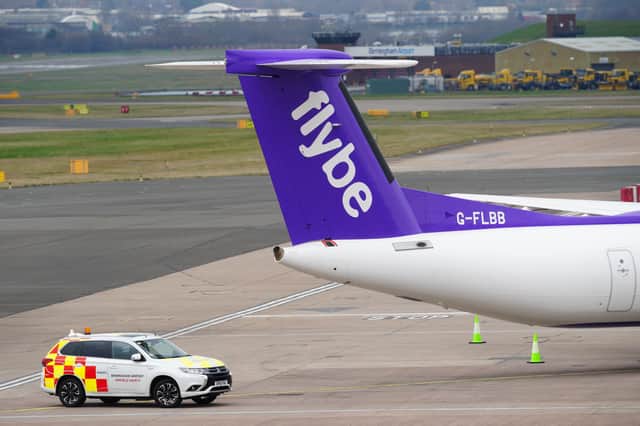 A Flybe plane at Birmingham Airport. The regional carrier ceased trading at the weekend and all scheduled flights were cancelled.