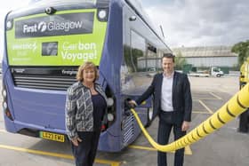 First Bus Scotland managing director Duncan Cameron with transport minister Fiona Hyslop at its Scotstoun depot in Glasgow in July. (Photo by First Bus)