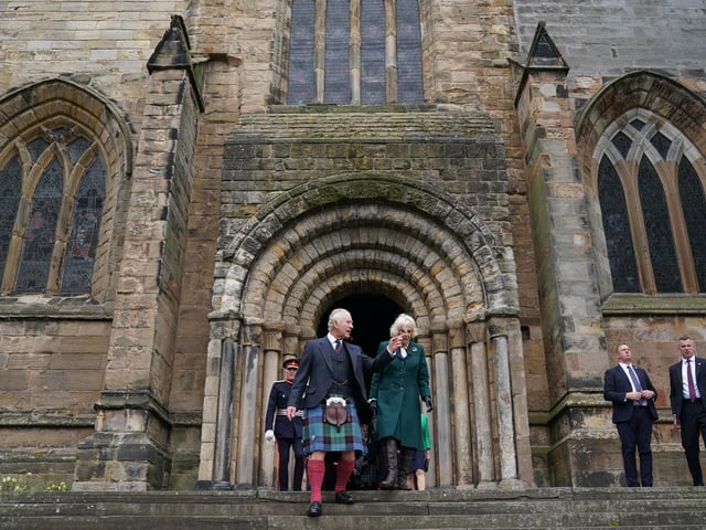 King Charles III and the Queen Consort leave Dunfermline Abbey, after a visit to mark its 950th anniversary, and after attending a meeting at the City Chambers in Dunfermline, Fife, where the King formally marked the conferral of city status on the former town.