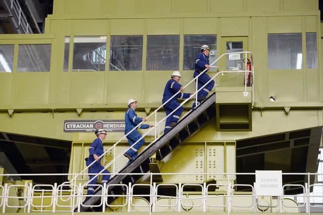 Workers on the fuelling machine at Hunterston B nuclear power station, which was kept in service for almost double its expected 25-year operational lifespan