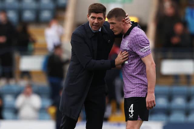 Rangers boss Steven Gerrard gives words of encouragement to John Lundstram at full-time after his side's win over Dundee. Picture: SNS