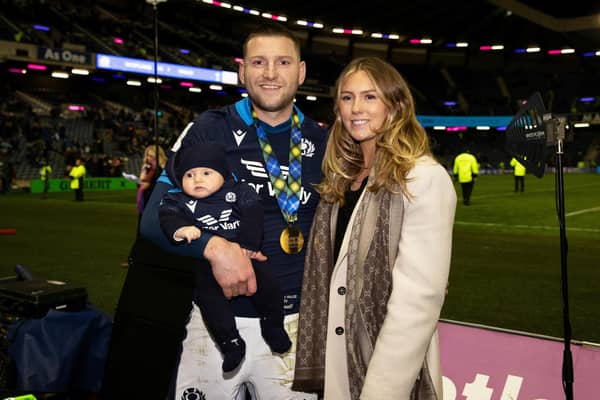 Finn Russell with partner Emma Canning and son Charlie. (Photo by Craig Williamson / SNS Group)
