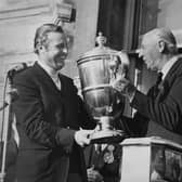 Sir Michael Bonallack OBE, then playing captain, is presented with the Walker Cup after Great Britain and Ireland's success at St Andrews in 1971.Picture: Cowper/Central Press/Hulton Archive/Getty Images.