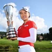 Minjee Lee poses with the trophy after winning the Amundi Evian Championship at Evian Resort Golf Club in France. Picture: Stuart Franklin/Getty Images.