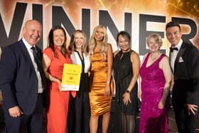 Eve McCurrich, Managing Director of Whiteburn and members of her team accepting the House Builder of the Year at the Scottish Home Awards.