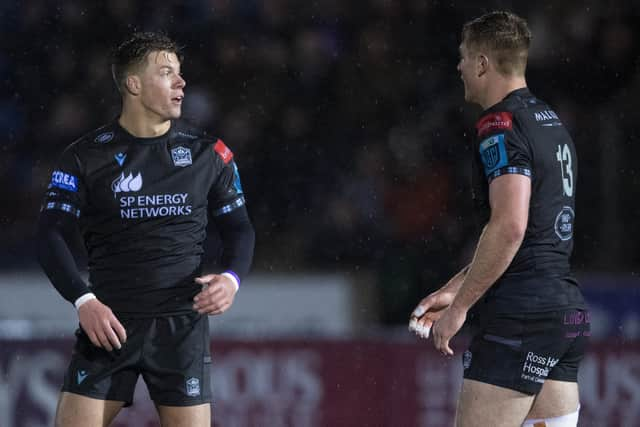 Huw Jones, pictured left with Stafford McDowell, will start on the bench but is likely to have an important role to play.  (Photo by Ross MacDonald / SNS Group)