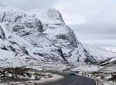 A car travels along the A82 in Glencoe in the Highlands. Picture: Andrew Milligan/PA Wire