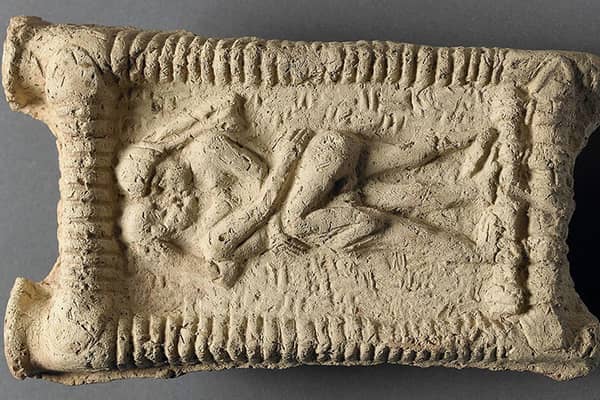 A picture issued by University of Copenhagen of a Babylonian clay model showing an erotic scene from 1800 BC.