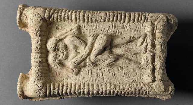 A picture issued by University of Copenhagen of a Babylonian clay model showing an erotic scene from 1800 BC.