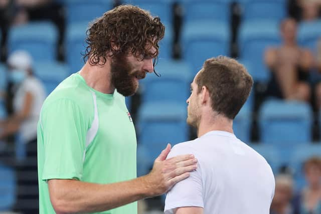 Opelka congratulates Murray on his victory.