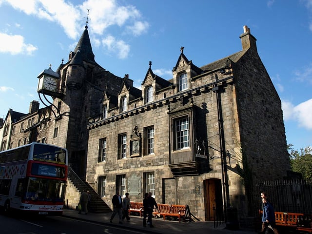 One of Edinburgh’s most photographed old buildings is the Canongate Tolbooth. It was built in 1591 at a time when the Canongate burgh was still separate from Edinburgh, and served as the district tolbooth, comprising a courthouse, jail and public meeting place. The Tolbooth has undergone a number of alterations over the centuries, the most notable being City Architect Robert Morham’s remodelling in 1875, which added its distinctive clock. The building now houses The People’s Story Museum and boasts a Category A listing.