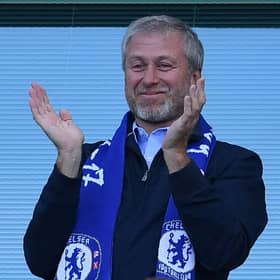 Chelsea's Russian owner Roman Abramovich applauds one of the team's five EPL title wins during his tenure.  (Photo credit should read BEN STANSALL/AFP via Getty Images)