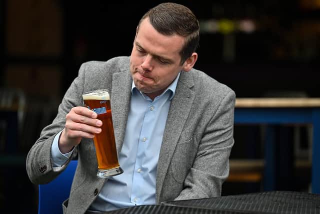 Scottish Conservative Party leader Douglas Ross enjoys a pint in Edinburgh. Picture: Jeff J Mitchell/Getty Images