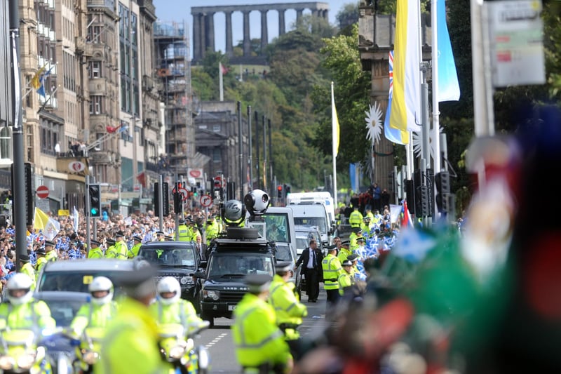 Pope Benedict XVI makes his way along Princes Street in Edinburgh.