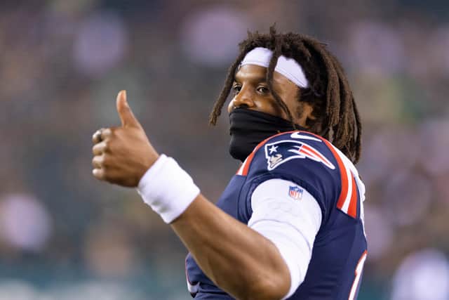 Cam Newton, pictured, will have in-house competition at the New England Patriots after the arrival of Mac Jones.