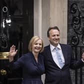 Liz Truss and husband Hugh O'Leary pose outside number 10 Downing Street
