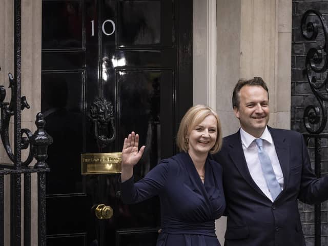 Liz Truss and husband Hugh O'Leary pose outside number 10 Downing Street