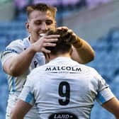 Glasgow Warriors' George Horne (9) celebrates his try against Edinburgh with Matt Fagerson. Picture: Ross MacDonald/SNS