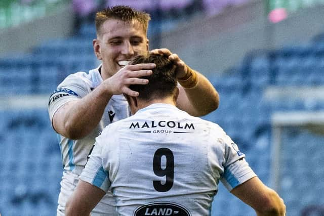 Glasgow Warriors' George Horne (9) celebrates his try against Edinburgh with Matt Fagerson. Picture: Ross MacDonald/SNS