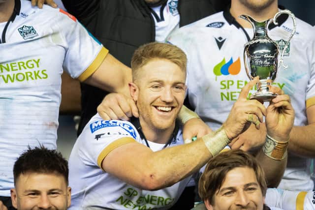 Glasgow Warriors' Kyle Steyn with the 1872 Cup after the 32-25 win over Edinburgh in the second leg at BT Murrayfield. (Photo by Ross Parker / SNS Group)
