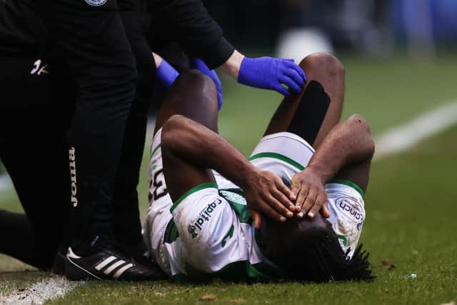 Hibs defender Rocky Bushiri goes down injured during the Scottish Cup fourth round defeat to Hearts on Sunday. (Photo by Craig Williamson / SNS Group)