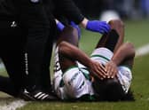 Hibs defender Rocky Bushiri goes down injured during the Scottish Cup fourth round defeat to Hearts on Sunday. (Photo by Craig Williamson / SNS Group)