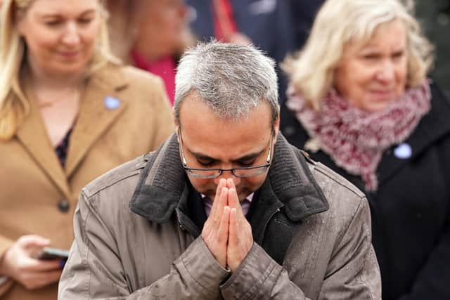 Guests attend a pandemic anniversary remembrance event and minute's silence at National Memorial Arboretum at Alrewas in Staffordshire on Friday March 11, 2022. Picture: PA Wire