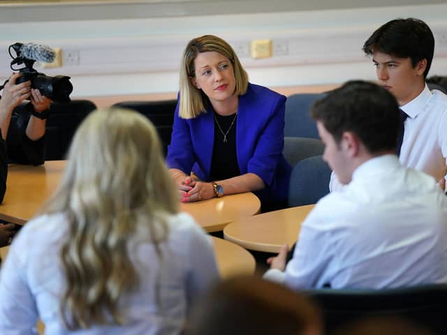 Education Secretary Jenny Gilruth chats to pupils during a visit to Craigmount High School in Edinburgh to mark SQA Results Day 2023. Andrew Milligan/PA Wire