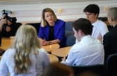 Education Secretary Jenny Gilruth chats to pupils during a visit to Craigmount High School in Edinburgh to mark SQA Results Day 2023. Andrew Milligan/PA Wire